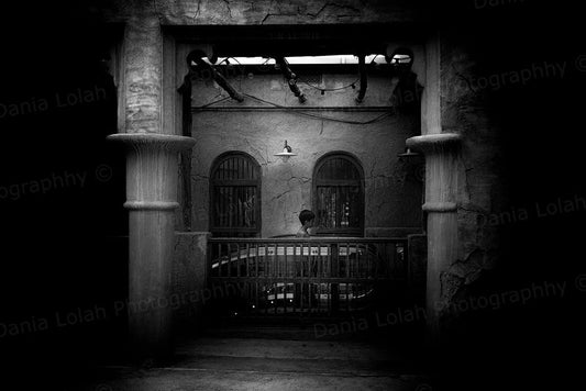 Boy in the Souq – Al Seef Street, Black & White Fine Art Download